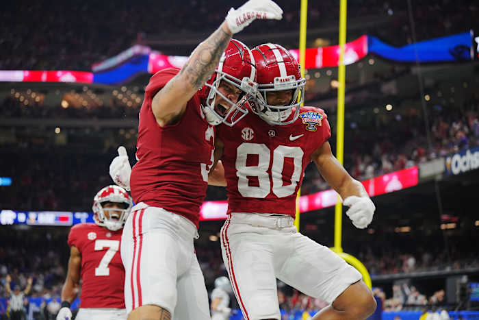 Alabama wide receiver Kobe Prentice celebrates with Jermaine Burton